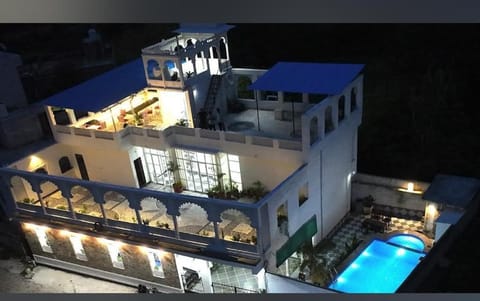Property building, Night, View (from property/room), Balcony/Terrace, Pool view, Swimming pool