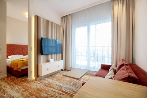 Bed, TV and multimedia, Living room, Seating area