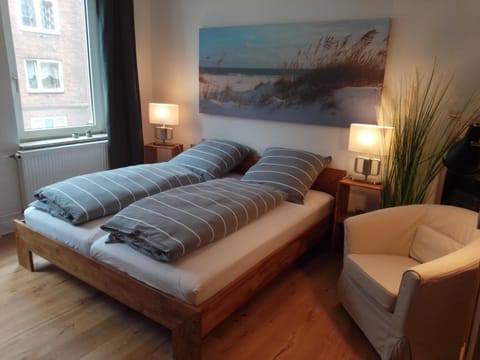 Bed, Seating area, Bedroom
