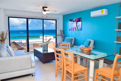 Natural landscape, Living room, Seating area, Dining area, Beach, Sea view, fireplace, air conditioner