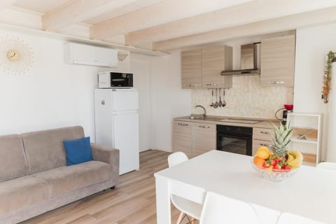 Kitchen or kitchenette, Living room, Dining area, oven, stove