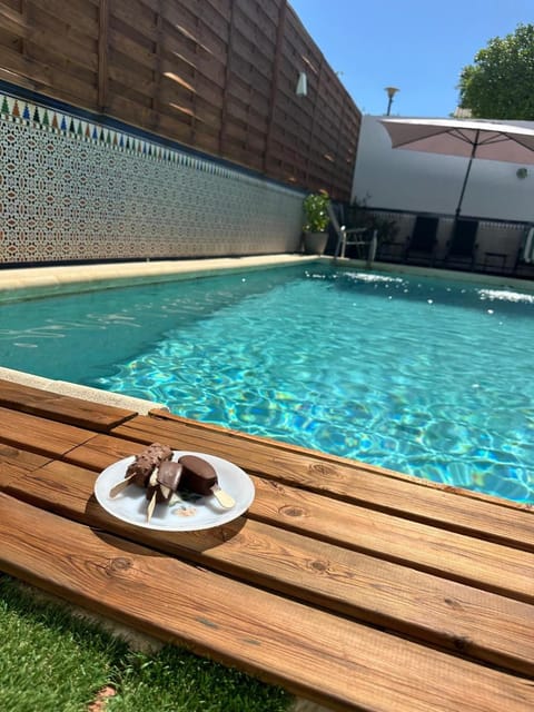 Property building, Living room, Swimming pool