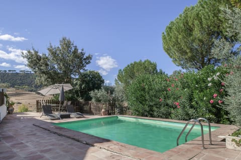Property building, Living room, Swimming pool