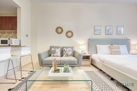 Property building, Living room, Seating area, Swimming pool
