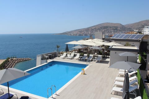Property building, Nearby landmark, Day, Natural landscape, Mountain view, Pool view, Sea view, Swimming pool, sunbed