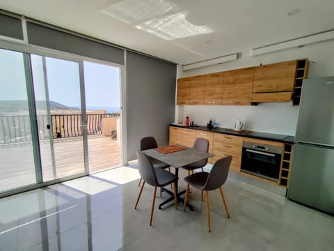 View (from property/room), Balcony/Terrace, Kitchen or kitchenette, Dining area