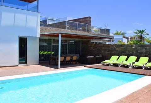 Property building, Living room, Swimming pool