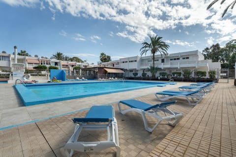 Property building, Living room, Swimming pool
