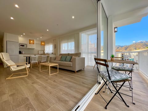 Kitchen or kitchenette, Living room, Dining area, Mountain view, Sea view, furniture, washing machine, air conditioner