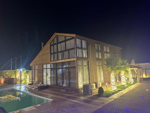 Property building, Night, Pool view, Swimming pool