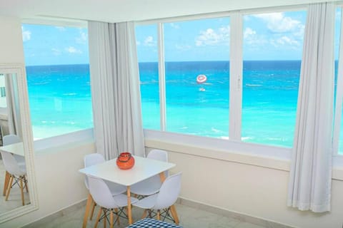 Natural landscape, Dining area, Beach, Sea view, air conditioner