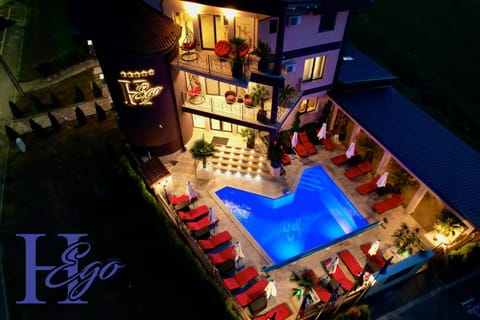Property building, Night, Pool view, Swimming pool, sunbed