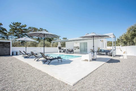 Patio, Day, Natural landscape, Pool view, Swimming pool, sunbed