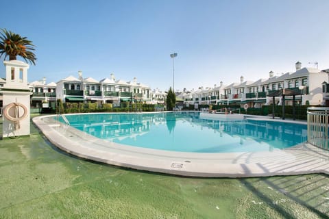 Property building, Living room, Swimming pool