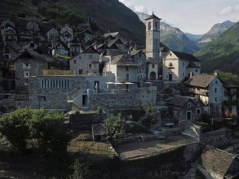 Property building, Nearby landmark, Day, Natural landscape, Landmark view, Mountain view