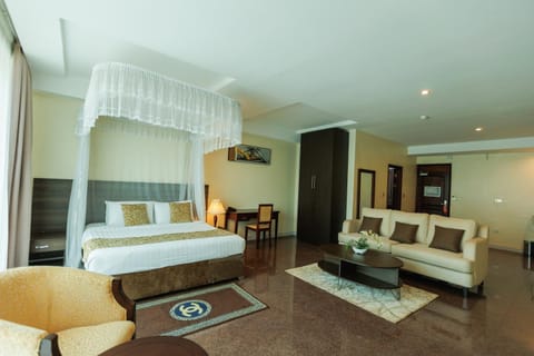 Bed, Living room, Seating area, Bedroom