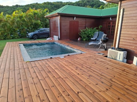 Patio, Day, Natural landscape, Pool view, Swimming pool, sunbed