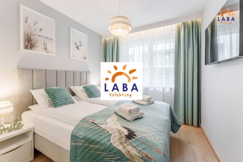 Bed, Property logo or sign, Photo of the whole room, Bedroom, towels