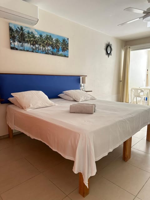 Bed, Photo of the whole room, Bedroom, fireplace, air conditioner