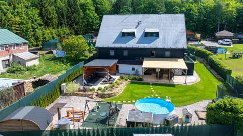 Property building, Children play ground, Hot Tub, Sauna, Spa and wellness centre/facilities, Seating area, Swimming pool