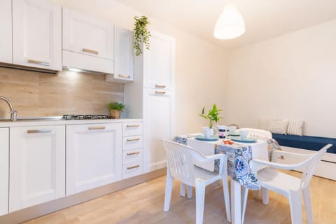 Kitchen or kitchenette, Living room, stove