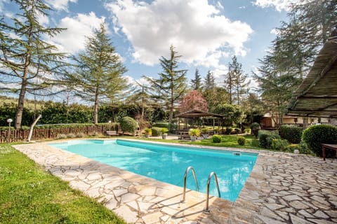 Property building, Living room, Swimming pool