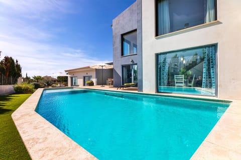Property building, Living room, Swimming pool