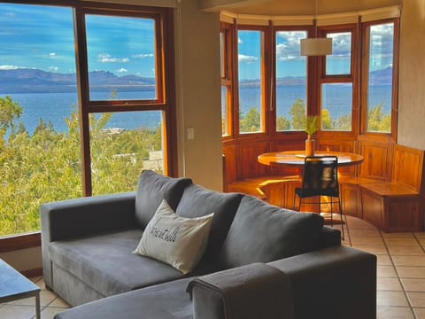 Natural landscape, TV and multimedia, Living room, Seating area, Dining area, Lake view, Mountain view