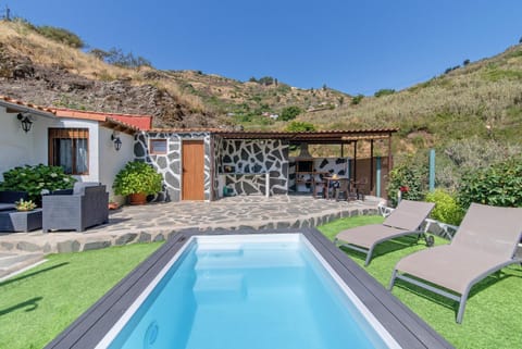 Property building, Living room, Swimming pool