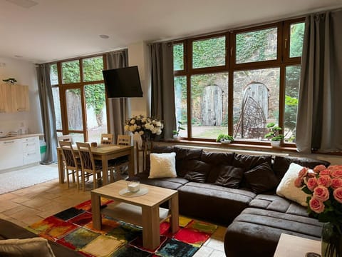 Communal lounge/ TV room, Garden, Seating area, Dining area, Garden view