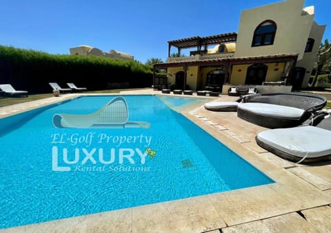 Property building, Seating area, Pool view, Swimming pool, sunbed