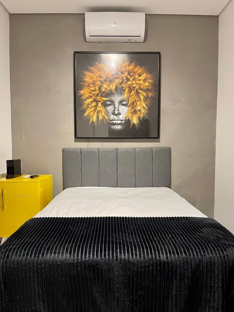 Bed, air conditioner
