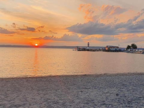Nearby landmark, Natural landscape, Beach, Sunset