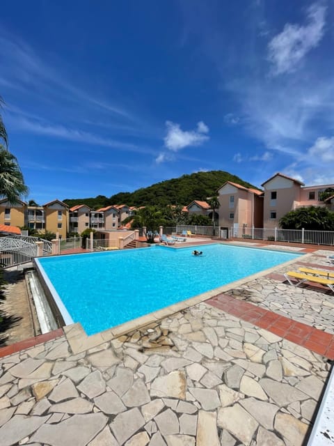 Property building, Day, Natural landscape, Pool view, Swimming pool, sunbed