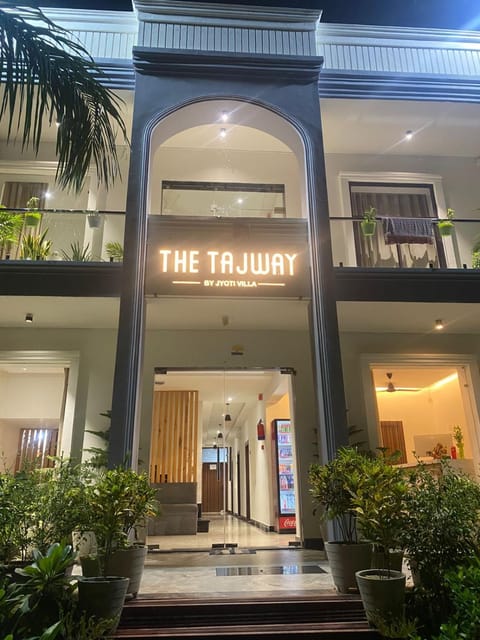 Property building, Facade/entrance, Night, Property logo or sign, Logo/Certificate/Sign
