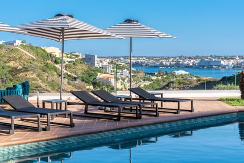Property building, Nearby landmark, Natural landscape, Pool view, Sea view, Swimming pool, sunbed
