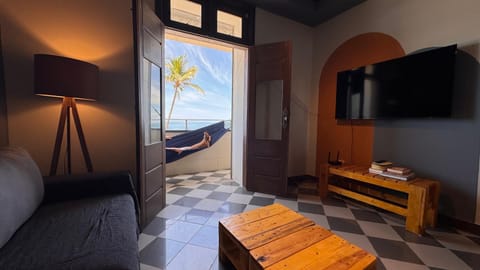 Communal lounge/ TV room, Natural landscape, TV and multimedia, Living room, Seating area