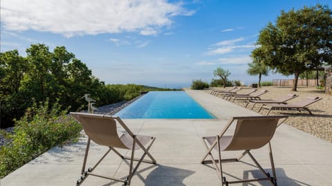 Natural landscape, Solarium, Swimming pool, sunbed