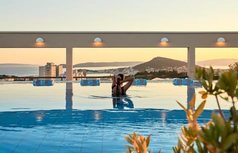 People, View (from property/room), Spa and wellness centre/facilities, Sea view, Swimming pool