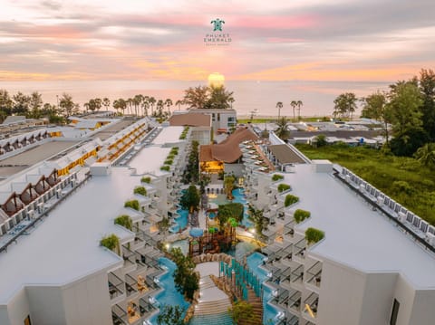 Property building, Property logo or sign, Activities, Bird's eye view, View (from property/room), Decorative detail, Beach, Aqua park, Pool view, Area and facilities, Swimming pool, Entertainment, Location, Sunset, Family, Parking