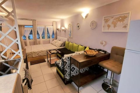 Bed, TV and multimedia, Living room, Seating area, Dining area