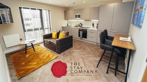 Kitchen or kitchenette, Living room, Seating area, Dining area