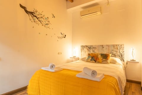 Bed, Photo of the whole room, Bedroom, towels, air conditioner