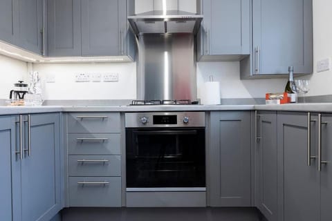 Kitchen or kitchenette, dishwasher, microwave, washing machine