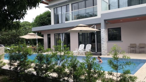 Property building, Patio, Facade/entrance, Swimming pool, Swimming pool