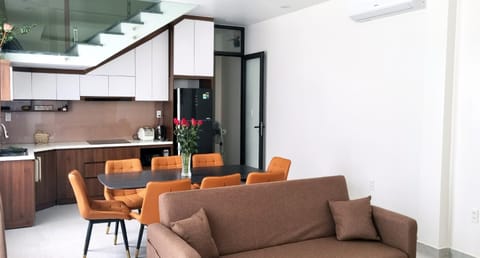 Kitchen or kitchenette, Living room, Dining area, minibar, stove, air conditioner
