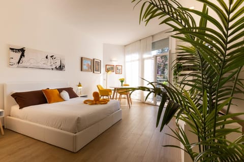 Bed, Day, Seating area, Bedroom