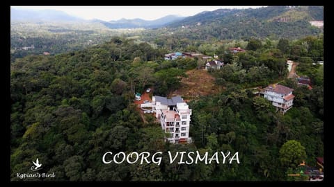 Property building, Natural landscape, Bird's eye view, Text overlay, Mountain view, Street view