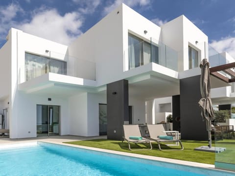 Property building, Pool view, Swimming pool, sunbed