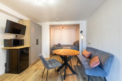 Property building, TV and multimedia, Living room, Dining area, Bedroom